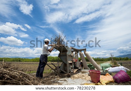 DALI, CHINA - MAY 25: An unidentified Chinese farmer works hard on the field on May 25, 2011 in Dali, China. For many farmers the annual income is as low as $800.