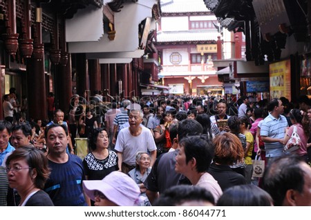 SHANGHAI - OCTOBER 4: tourist sites attract huge crowds of people during Chinese National Day holiday on October 4, 2011 in Shanghai, China. Here at Yuyuan commercial tourist street.