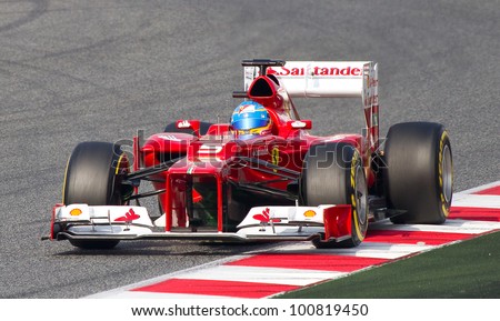 BARCELONA - MARCH 4: Fernando Alonso of Ferrari F1 team racing at Formula One Teams Test Days at Catalunya circuit on March 4, 2012 in Barcelona, Spain.