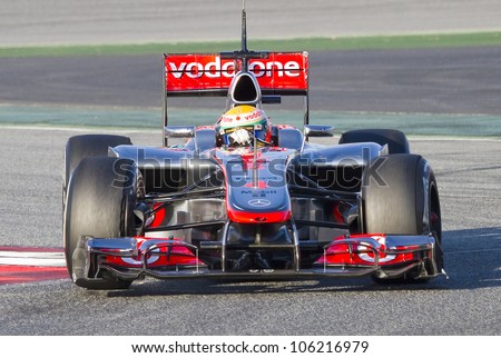 BARCELONA - FEBRUARY 21: Lewis Hamilton of McLaren F1 team racing at Formula One Teams Test Days at Catalunya circuit on February 21, 2012 in Barcelona, Spain.