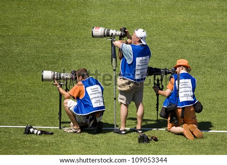 BARCELONA, SPAIN - JULY 28: Unidentified photographers work during the 20th European Athletics Championships at the Olympic Stadium on July 28, 2010, in Barcelona, Spain.