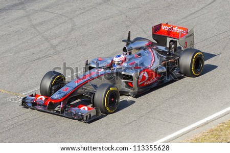 BARCELONA - FEBRUARY 24: Jenson Button of McLaren F1 team racing at Formula One Teams Test Days at Catalunya circuit on February 24, 2012 in Barcelona, Spain.