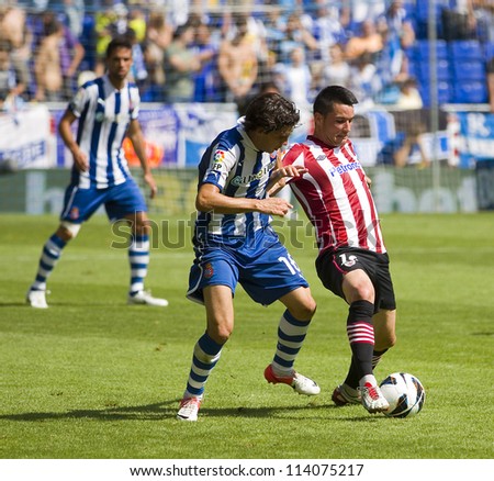 BARCELONA, SPAIN - SEPTEMBER 16: Isma Lopez (R) of Athletic in action during the Spanish League match between Espanyol and Athletic Club, final score 3-3, on September 16, 2012, in Barcelona, Spain.