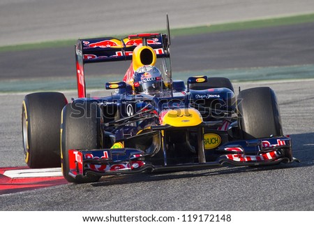 BARCELONA - FEBRUARY 21: Sebastian Vettel of Red Bull F1 team racing at Formula One Teams Test Days at Catalunya circuit on February 21, 2012 in Barcelona, Spain.