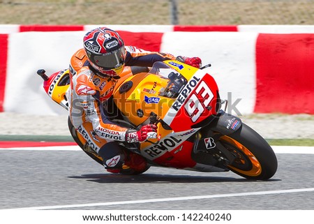 BARCELONA - JUNE 14: Marc Marquez of Repsol Honda team racing at Free Practice Session of MotoGP Grand Prix of Catalunya, on June 14, 2013 in Barcelona, Spain. Valentino Rossi posts the fastest time.