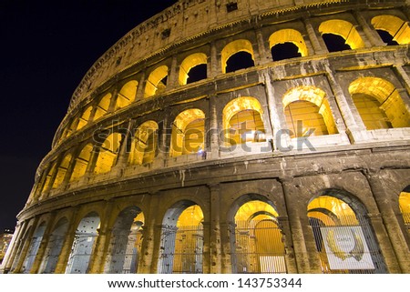 ROME - DECEMBER 8: Coliseum exterior on December 8, 2012 in Rome, Italy. The Coliseum is one of Rome\'s most popular tourist attractions with over 5 million visitors per year.