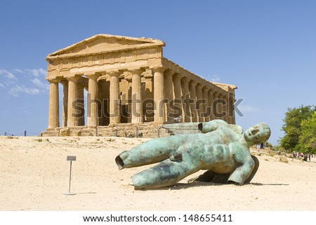 AGRIGENTO, ITALY - JULY 14: Temple of Concordia, one of the most outstanding examples of Greek art and architecture, and one of the main attractions of Sicily, on July 14, 2013, in Agrigento, Italy.