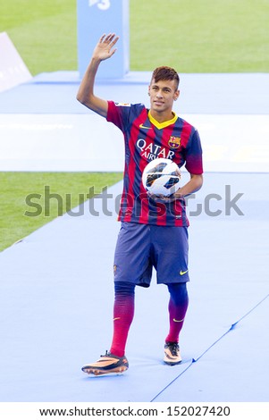 BARCELONA - JUNE 3: Neymar Junior, a FC barcelona new player, poses for the photographers during his official presentation at the Camp Nou stadium , on June 3, 2013, in Barcelona, Spain.