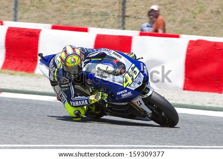 BARCELONA, SPAIN - JUNE 14: Valentino Rossi of Yamaha team racing at Free Practice Session of MotoGP Grand Prix of Catalunya, on June 14, 2013 in Barcelona, Spain. He posts the fastest time.