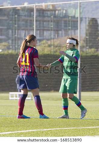 BARCELONA - DECEMBER 21: Players fair play after the Superliga - Women\'s Football Spanish League - match between FC Barcelona and Levante UD, 1-0, on December 21, 2013, in Barcelona, Spain.