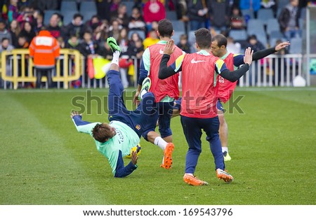 BARCELONA, SPAIN - JANUARY 3: Some players in action at FC Barcelona team in open doors training session at Mini Estadi stadium, with 13,200 spectators, on January 3, 2014, in Barcelona, Spain.