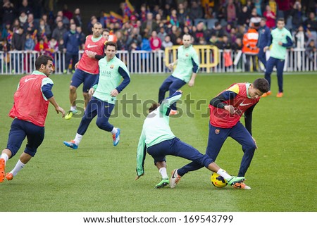 BARCELONA, SPAIN - JANUARY 3: Some players in action at FC Barcelona team in open doors training session at Mini Estadi stadium, with 13,200 spectators, on January 3, 2014, in Barcelona, Spain.