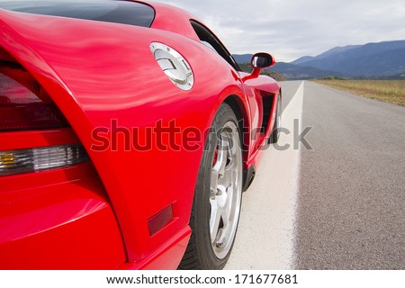 LA SEU D\'URGELL, SPAIN - OCTOBER 6: A Dodge Viper SRT take part in Road and Track racing weekend organized by American Car Club, on October 6, 2012, in the airport of La Seu d\'Urgell, Spain.