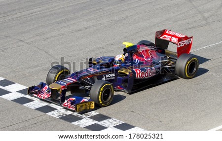 BARCELONA - FEBRUARY 21: Jean Eric Vergne of Toro Rosso F1 team racing at Formula One Teams Test Days at Catalunya circuit on February 21, 2012 in Barcelona, Spain.