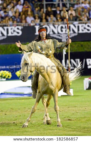 BARCELONA, SPAIN - SEPTEMBER 23: Jean Marc Imbert performs during a horse exhibition at the CSIO 100th International Jumping Competition, on September 23, 2011, in Real Club de Polo, Barcelona, Spain.