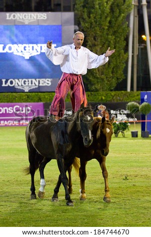 BARCELONA, SPAIN - SEPTEMBER 23: Jean Marc Imbert performs during a horse exhibition at the CSIO 100th International Jumping Competition, on September 23, 2011, in Real Club de Polo, Barcelona, Spain.