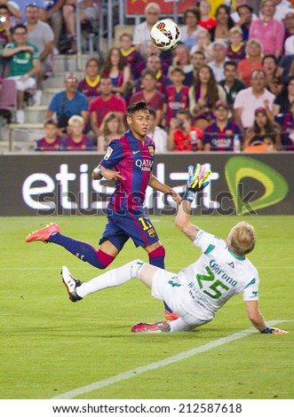 BARCELONA, SPAIN - AUGUST 18: Neymar Junior of FCB scores a goal at Gamper friendly match between FC Barcelona and Club Leon FC, final score 6-0, on August 18, 2014, in Camp Nou, Barcelona, Spain.