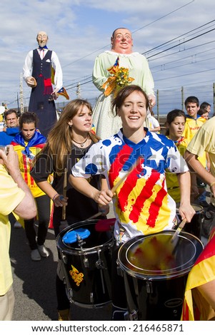 BARCELONA - SEPTEMBER 11: Catalans made a 400km human chain to show their desire for independence from Spain, on Sept. 11, 2013 in Barcelona, Spain. More than 1 million people took part in the event.