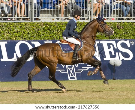 BARCELONA, SPAIN - SEPTEMBER 25: Malin Baryard Johnsson from Sweden rides horse H&M Tornesch at the 100th CSIO event at the Real Club de Polo Barcelona, on September 25, 2011, in Barcelona, Spain.