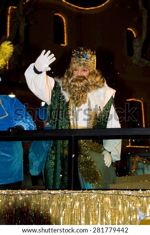 BARCELONA - JANUARY 5: Caspar King at the Biblical Magi Three Wise Men parade, who give toys to the children. Is a traditional spanish celebration. January 5, 2012 in Alella, Barcelona, Spain.