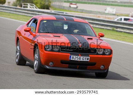 VALENCIA, SPAIN - APRIL 25: A red Dodge Challenger RT take part in American Fest weekend organizated in circuit Ricardo Tormo, on April 25, 2015, in Cheste, Valencia, Spain.
