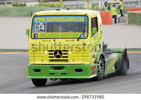 VALENCIA, SPAIN - APRIL 25: European Truck Racing Championship. Orlando Rodriguez of Mercedes compete at Ricardo Tormo circuit on April 25, 2015, in Cheste, Valencia, Spain. Jochen Hahn wins the race.
