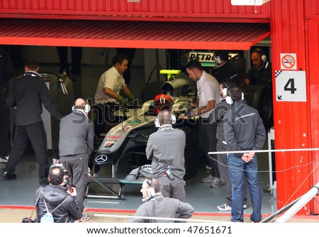 BARCELONA - FEBRUARY 28: Michael Schumacher (Mercedes) in the pit during Formula One Teams Test Days at Catalunya circuit February 28, 2010 in Barcelona.
