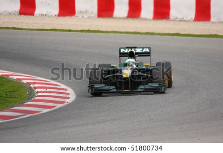 BARCELONA - FEBRUARY 28: Heikki Kovalainen (Lotus) tests his new car during Formula One Teams Test Days at Catalunya circuit February 28, 2010 in Barcelona.