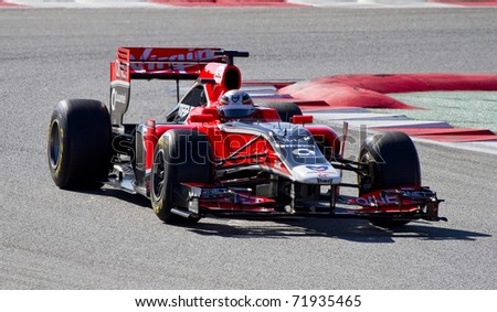 BARCELONA - FEBRUARY 18: Jerome D\'Ambrosio (Virgin) tests his new F1 car during Formula One Teams Test Days at Catalunya circuit February 18, 2011 in Barcelona (Spain).