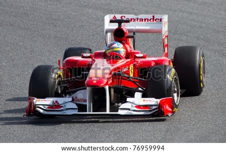 BARCELONA - FEBRUARY 18: Fernando Alonso (Ferrari) tests his F1 car during Formula One Teams Test Days at Catalunya circuit on February 18, 2011 in Barcelona, Spain.
