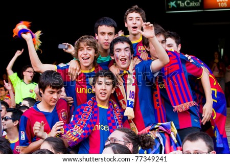 BARCELONA - MAY 13: Unidentified FC Barcelona supporters celebrate the Spanish League Championship victory in Camp Nou stadium, on May 13, 2011 in Barcelona, Spain.