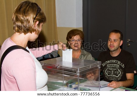 BARCELONA - MAY 22: Unidentified woman votes at Spanish municipal elections, on May 22, 2011 in Barcelona, Spain.