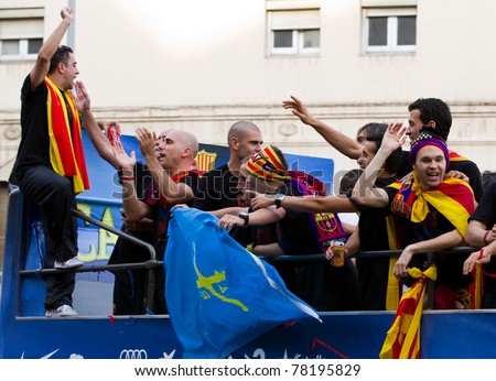 BARCELONA - MAY 29: FC Barcelona players celebrate the European Champions League and Spanish League trophies, on May 29, 2011 in Barcelona, Spain.