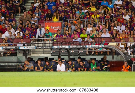 BARCELONA - AUGUST 22: Barcelona coach and staff during the Gamper Trophy final match between FC Barcelona and Napoli, final score 5 - 0, on August 22, 2011 in Camp Nou stadium, Barcelona, Spain.