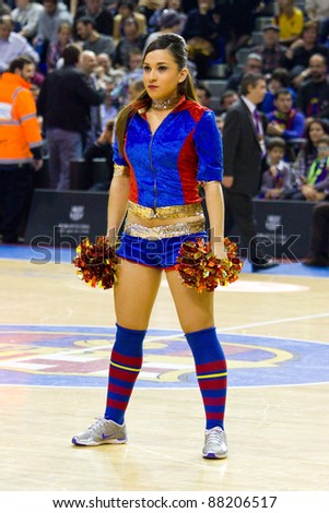 BARCELONA - MARCH 24: Unidentified cheerleaders perform during the Euroleague basketball match between Barcelona and Panathinaikos, final score 71-75, on March 24, 2011 in Barcelona, Spain.