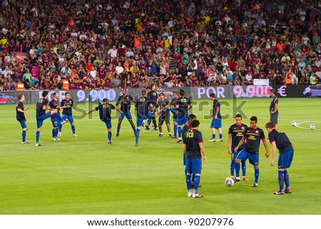BARCELONA - AUGUST 17: Barcelona players warm-up before the Spanish Super Cup final match between FC Barcelona and Real Madrid, 3 - 2, on August 17, 2011 in Camp Nou stadium, Barcelona, Spain.