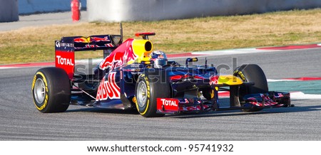 BARCELONA - FEBRUARY 21: Sebastian Vettel of Red Bull Racing team races during Formula One Teams Test Days at Catalunya circuit on February 21, 2012 in Barcelona, Spain.