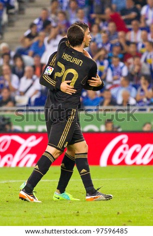 BARCELONA - OCTOBER 2: Gonzalo Higuain celebrate his goal at the Spanish League match between RCD Espanyol and Real Madrid, final score 0 - 4, on October 2, 2011 in Cornella stadium, Barcelona, Spain.