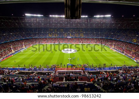 BARCELONA - SEPTEMBER 13: Crowd of people in Camp Nou stadium before the Champions League match between FC Barcelona and AC Milan, final score 2 - 2, on September 13, 2011, in Barcelona, Spain.