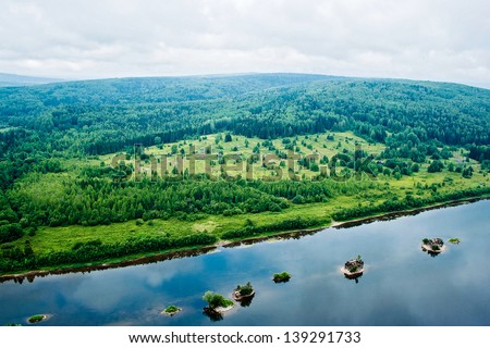 Top view of an abandoned village in the Russian taiga near the Vishera river