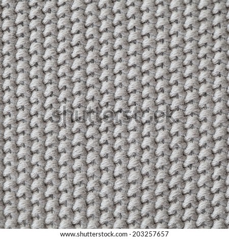 Unusual Abstract light grey knitted pattern background texture
