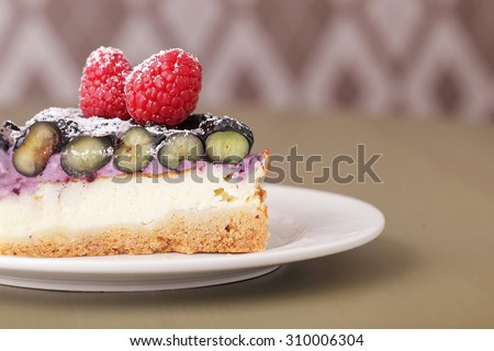 fresh delicious cake with berries closeup background texture