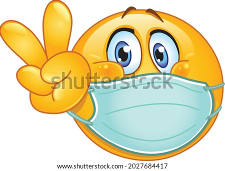 Emoji emoticon with medical mask over mouth making V sign. peace, victory or vegan gesture.