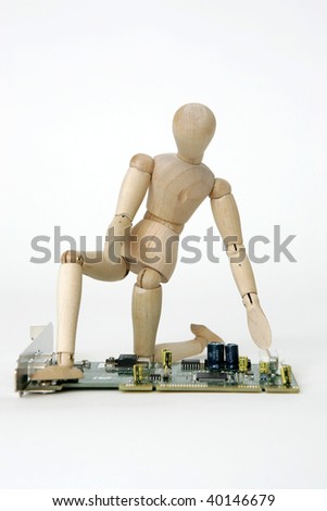 Jointed doll with computer circuit board, isolated on white background