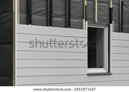 Similar – Image, Stock Photo Board on a house wall with the inscription ‘go vegan’ next to it are cable ducts with distribution boxes