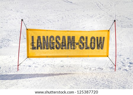 Speed warning sign on slope