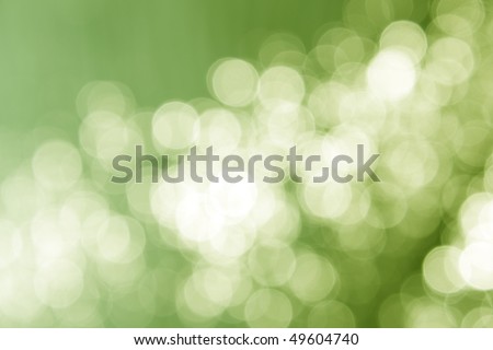 Fresh abstract background, green magic lights, bokeh.