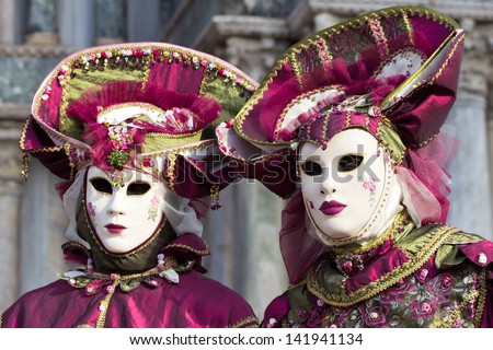 VENICE - FEBRUARY 7: Costumed people on the Piazza San Marco during Venice Carnival on February 7, 2013 in Venice, Italy. This year the Carnival was held between January 26 - February 12.