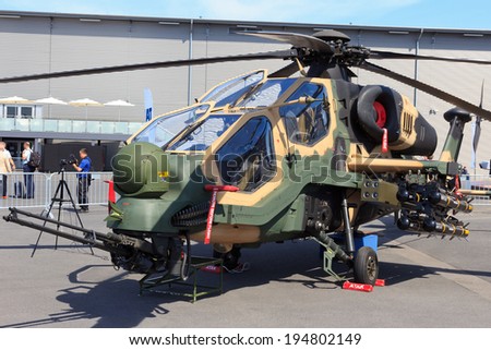 BERLIN, GERMANY - MAY 21: Turkish Aerospace Industries T129 Attack helicopter at the Int. Aerospace Exhibition ILA on May 21st, 2014 in Berlin, Germany. The helicopter is based on the Agusta A129.