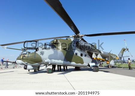 BERLIN, GERMANY - MAY 22: Russian made Mi-24V attack helicopter of the Czech Air Force at the International Aerospace Exhibition ILA on May 22nd, 2014 in Berlin, Germany.